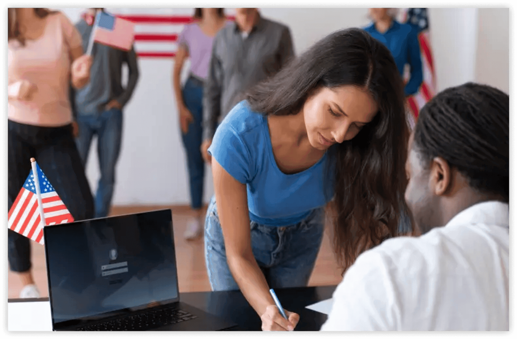 a girl writing on a paper in front of a person sitting on a chair